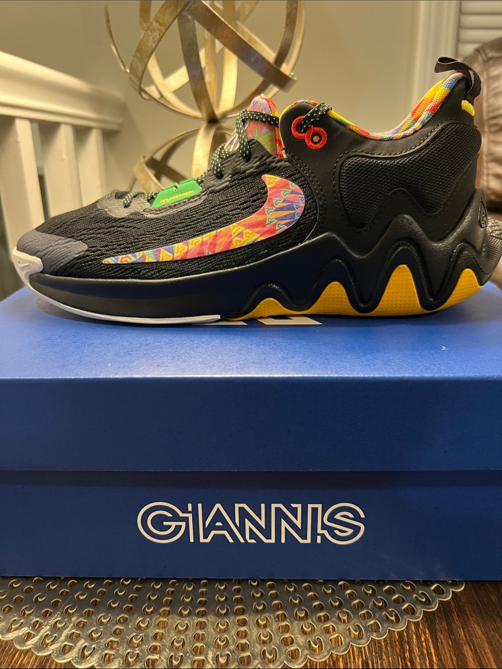 Nike Kids Black Sneakers with Yellow Accents and Multicolor Swoosh
